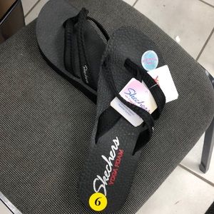 Women’s Sketchers with Yoga Foam.